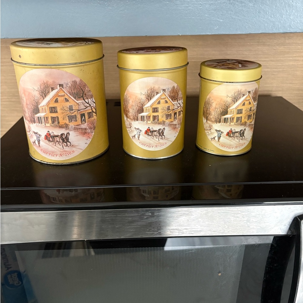 Currier & Ives set of three nesting tins 5 1/2 inch height of largest canister